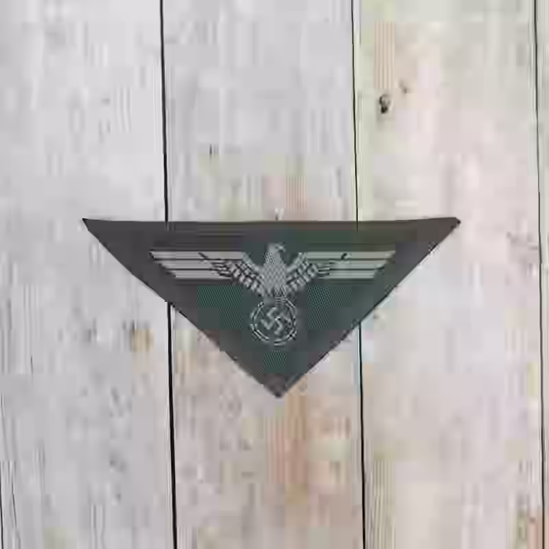 Wehrmacht Army Enlisted Men's Silk Woven Breast Eagle 1944 - WWII-era Wehrmacht enlisted men’s silk woven breast eagle, 1944.