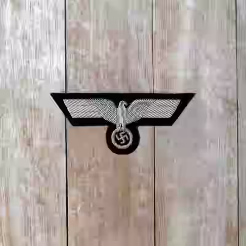 Panzer Officer's Hand Embroidered Silver Breast Eagle - WWII-era Panzer officers’ hand-embroidered silver breast eagle.