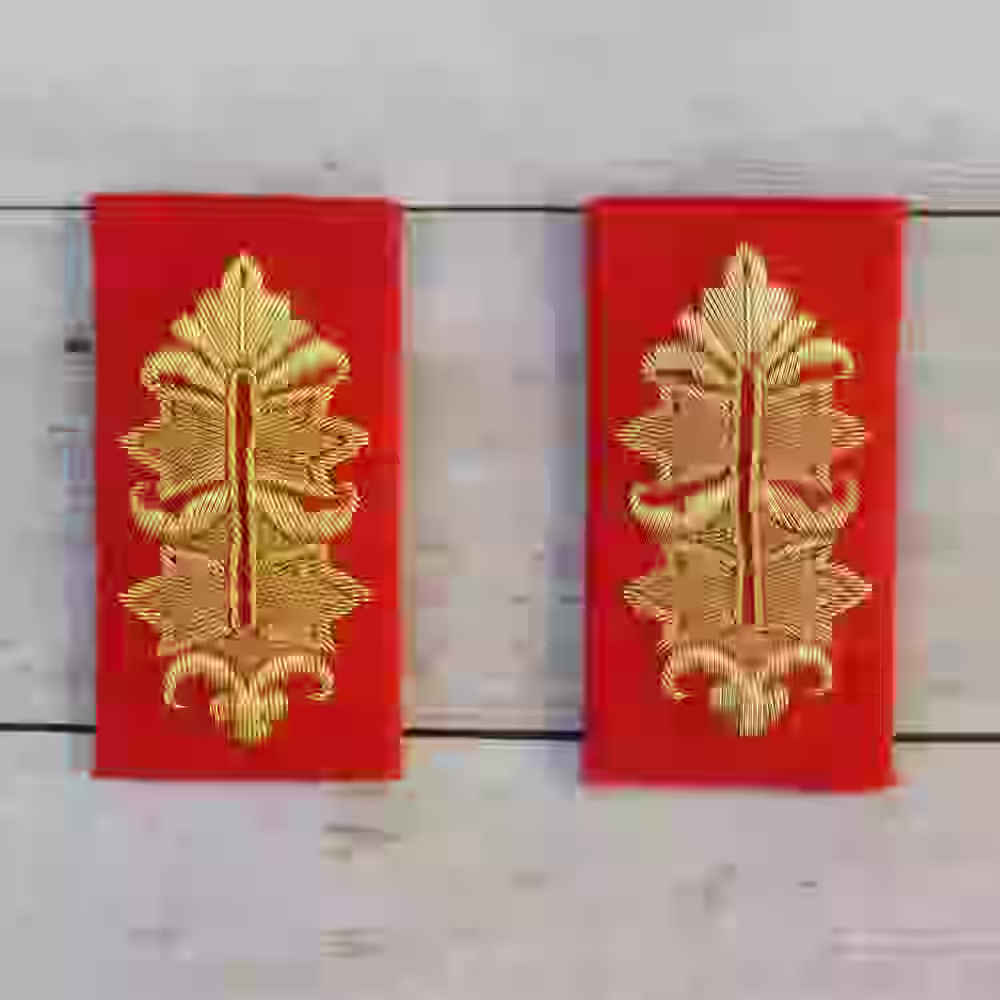 Waffenrock Wehrmacht General's Cuff Tabs - Hand-embroidered Waffenrock Wehrmacht generals cuff tabs with gold thread on red wool.