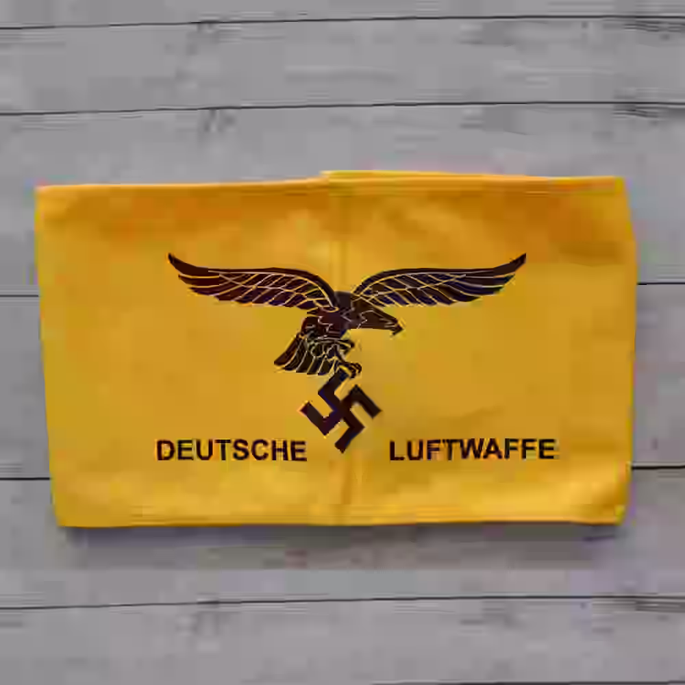 Deutsches Luftwaffe Armband - WWII-era Luftwaffe armband with printed design on yellow wool background.