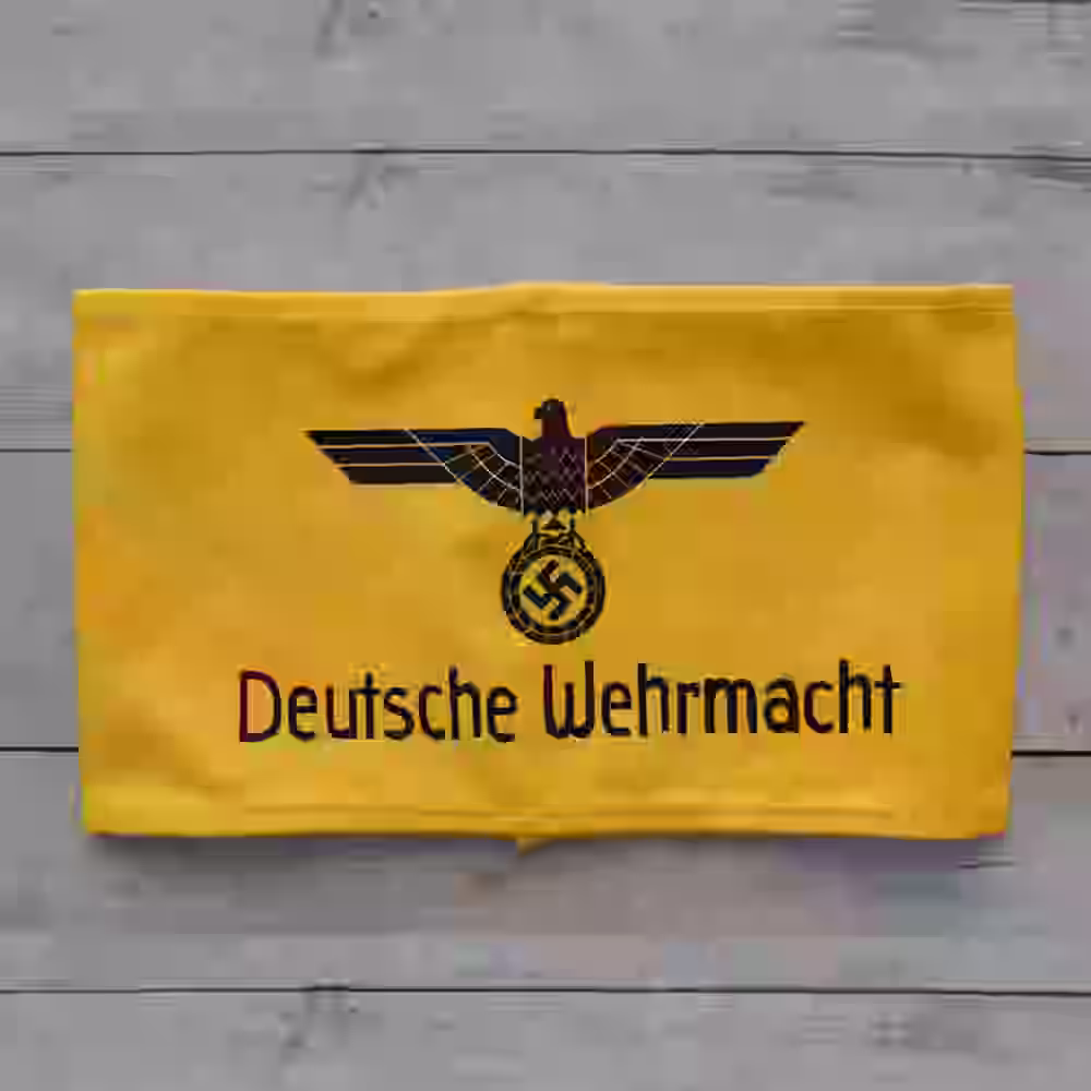 Deutsches Wehrmacht Armband - WWII-era Wehrmacht armband with black lettering on yellow wool background.