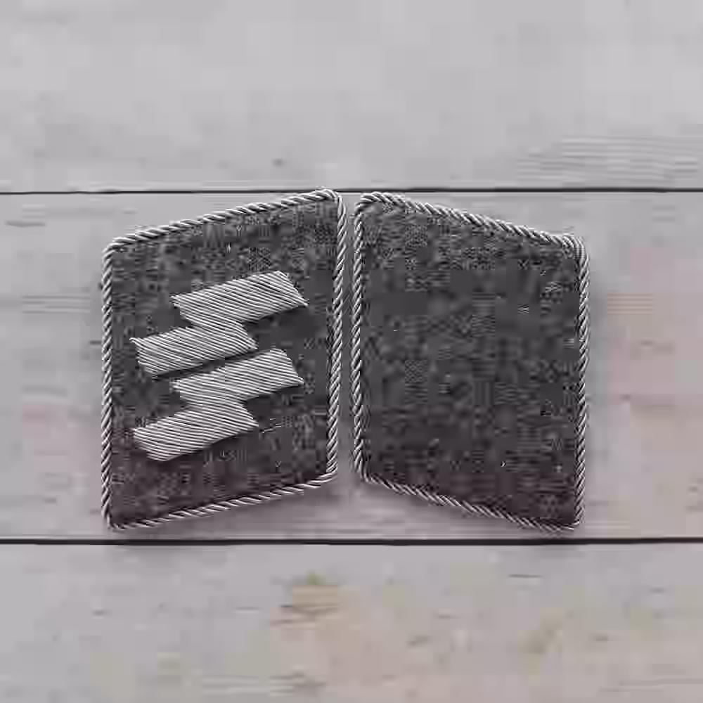 SS-Stammabteilung Reserve Unit Officer Collar Tabs - WWII-era SS-Stammabteilung reserve unit officer collar tabs with silver thread on grey-whitesmoke wool background.